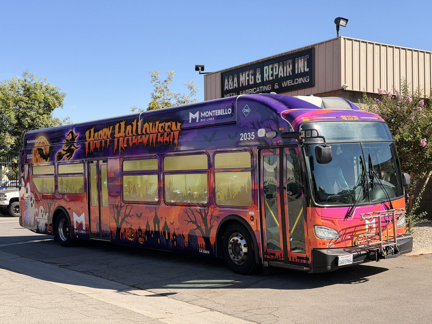 Montebello Bus Lines 2035 in a full Happy Halloween vinyl wrap, front three-quarter view