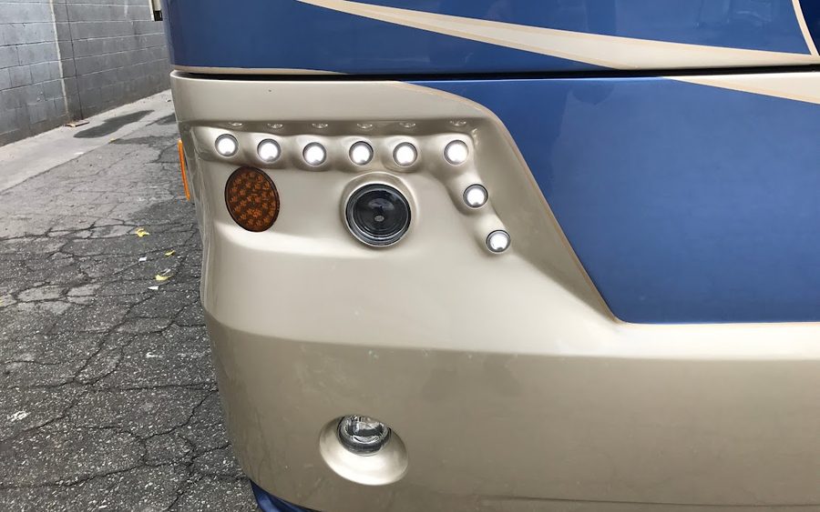 Custom fiberglass headlight housings - fabricated and blended into the cap