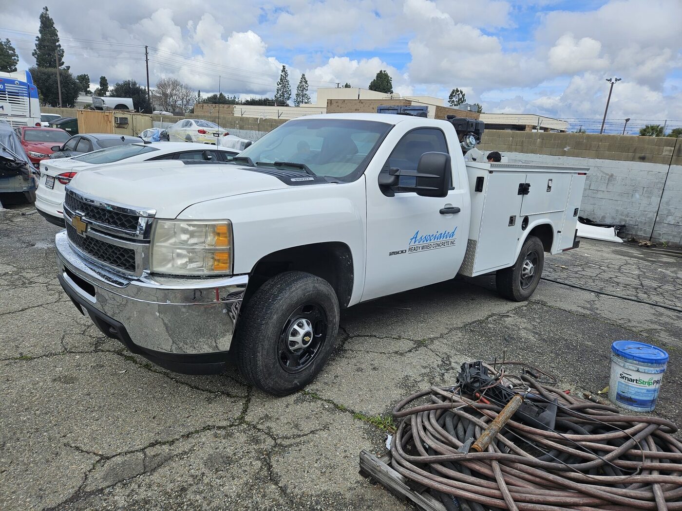 Associated Ready Mixed Concrete Silverado 2500HD service truck after front-end repair and refinish