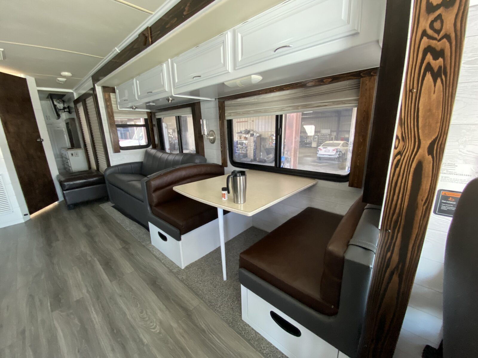 RV cabin with refreshed flooring and seating