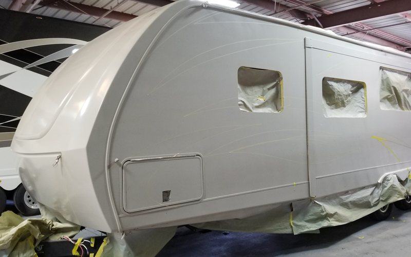 Travel trailer - masked and prepped in the booth